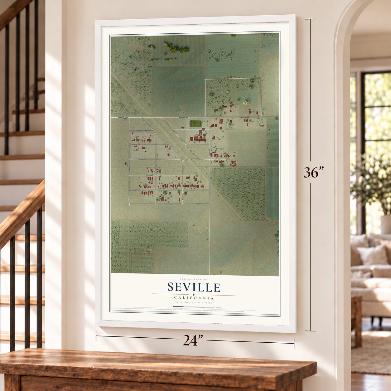 Seville, California map, 24 x 36 inch print in a white frame by a staircase