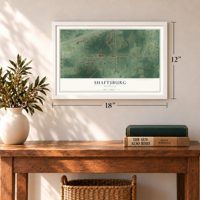 Shaftsburg, Michigan map, 12 x 18 inch print in a white frame in an entryway