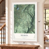 Sharon, Connecticut map, 24 x 36 inch print in a white frame by a staircase