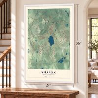 Sharon, Massachusetts map, 24 x 36 inch print in a white frame by a staircase