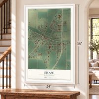 Shaw, Mississippi map, 24 x 36 inch print in a white frame by a staircase