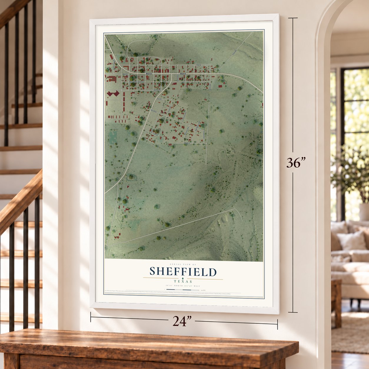 Sheffield, Texas map, 24 x 36 inch print in a white frame by a staircase