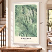 Sheffield, Vermont map, 24 x 36 inch print in a white frame by a staircase