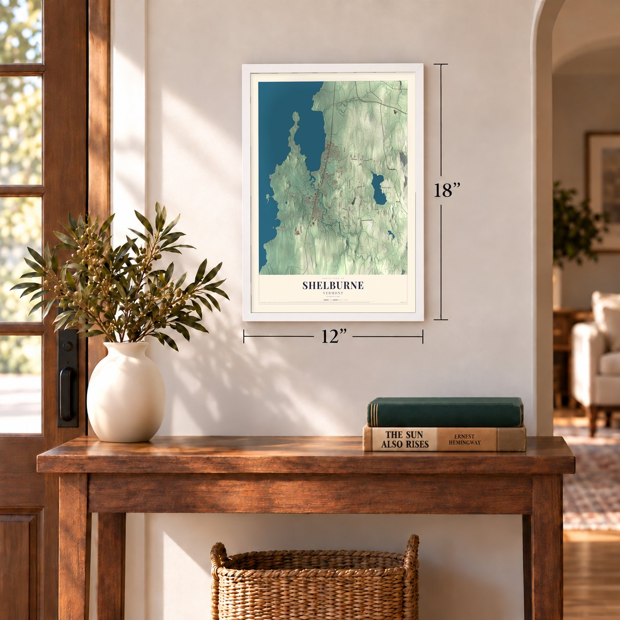 Shelburne, Vermont map, 12 x 18 inch print in a white frame in an entryway