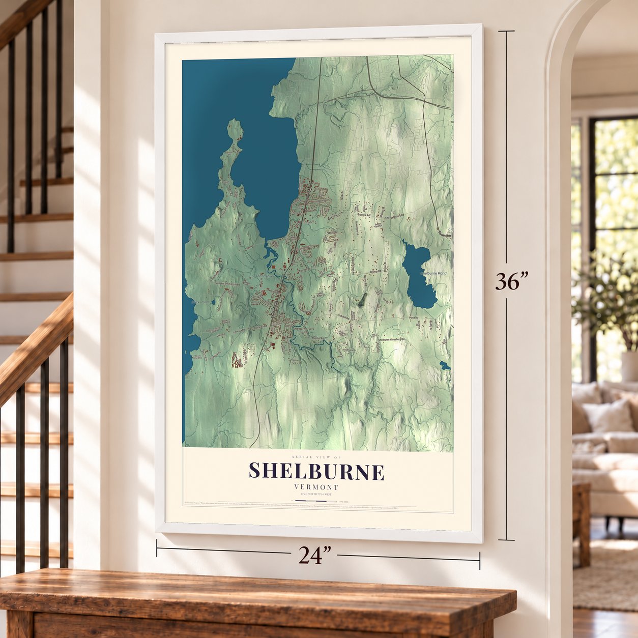 Shelburne, Vermont map, 24 x 36 inch print in a white frame by a staircase