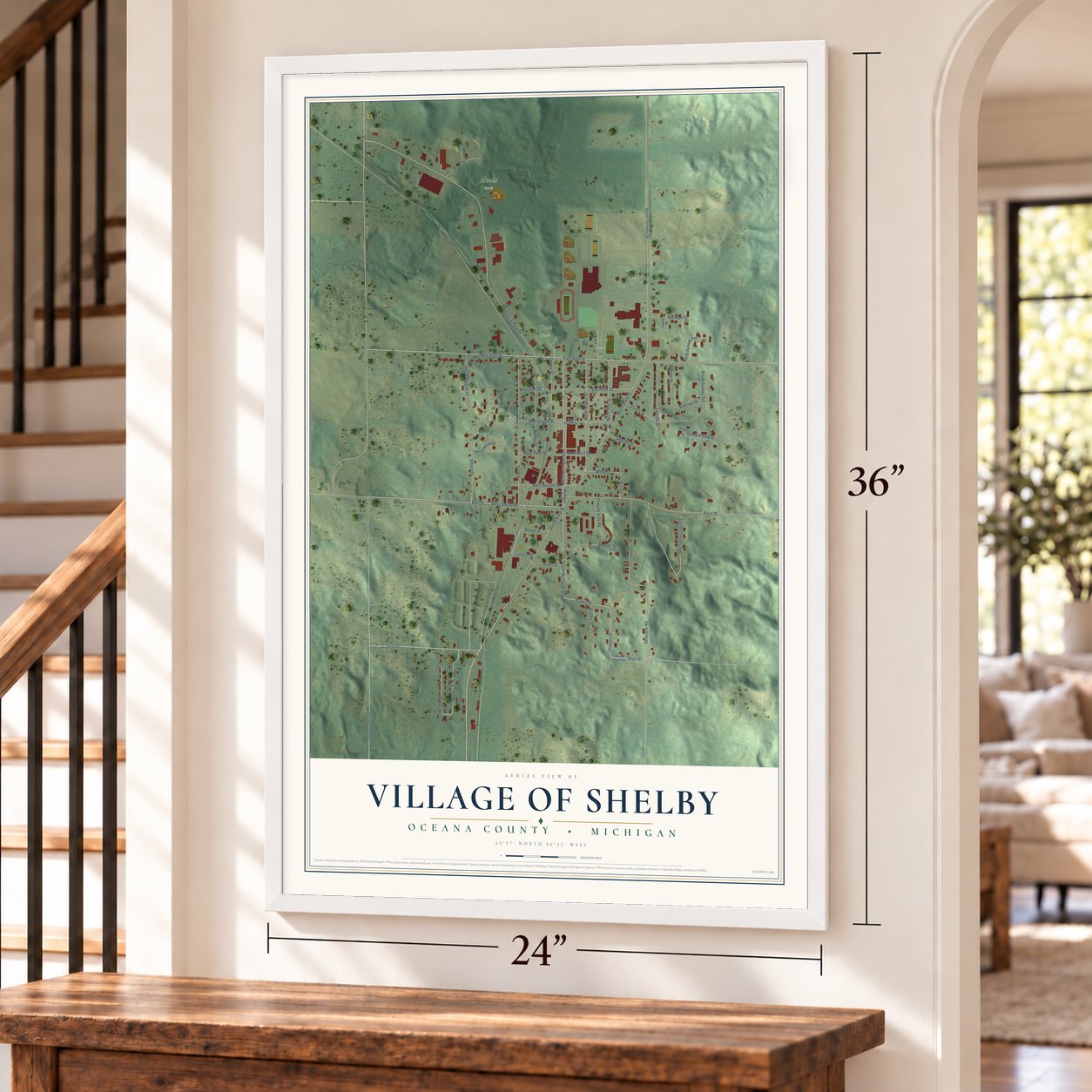 Shelby, Michigan map, 24 x 36 inch print in a white frame by a staircase
