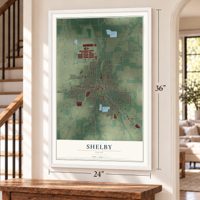 Shelby, Ohio map, 24 x 36 inch print in a white frame by a staircase