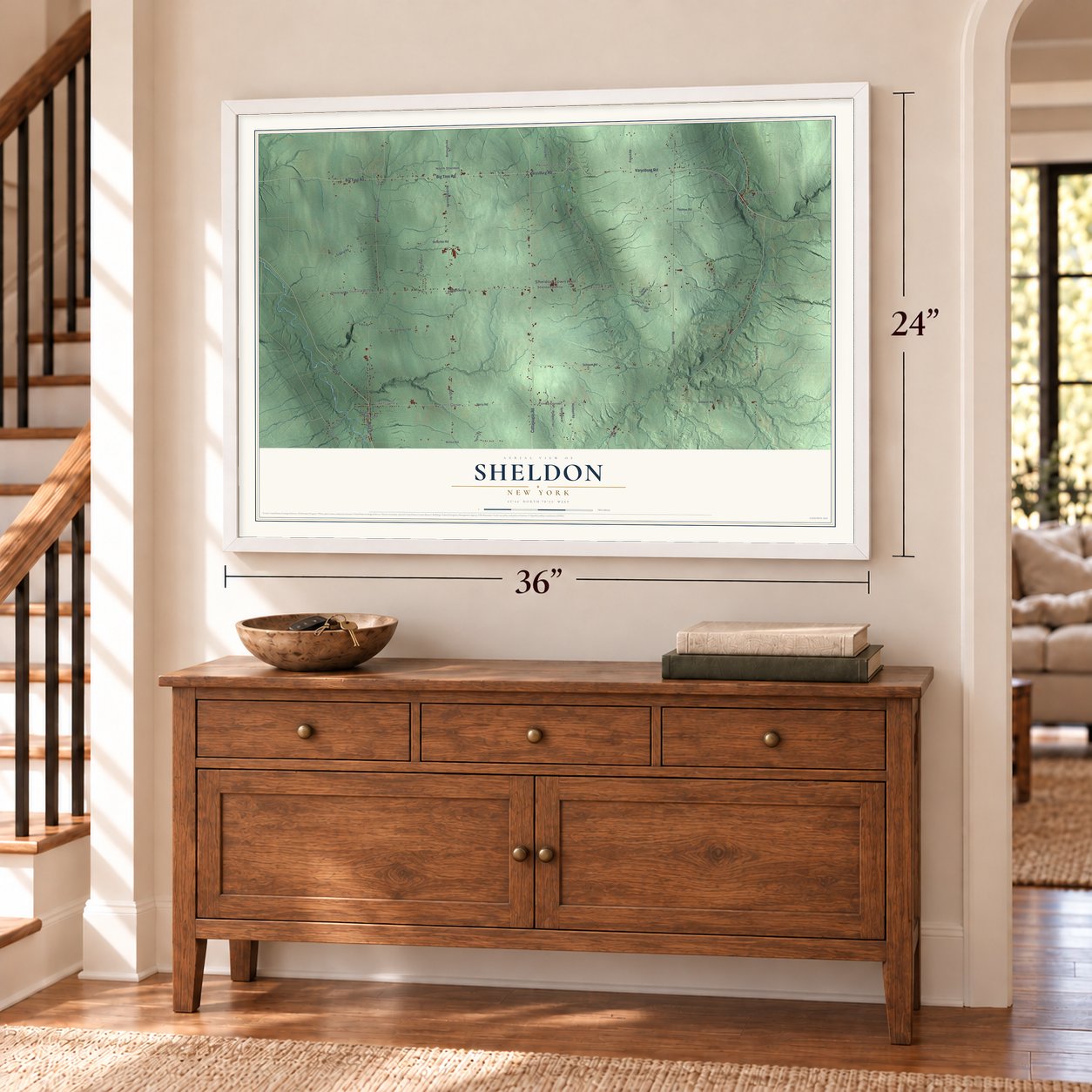 Sheldon, New York map, 24 x 36 inch print in a white frame above a dresser by a staircase