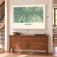 Sheldon, Vermont map, 24 x 36 inch print in a white frame above a dresser by a staircase