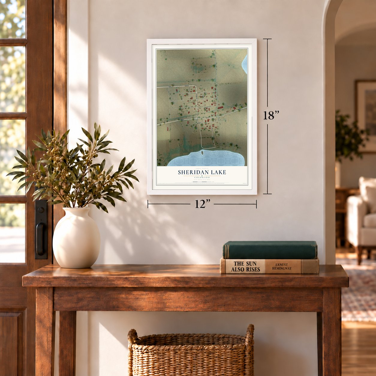 Sheridan Lake, Colorado map, 12 x 18 inch print in a white frame in an entryway