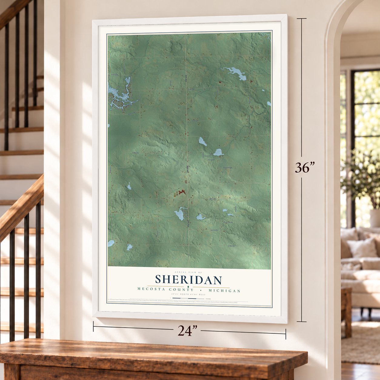 Sheridan, Mecosta County, Michigan map, 24 x 36 inch print in a white frame by a staircase