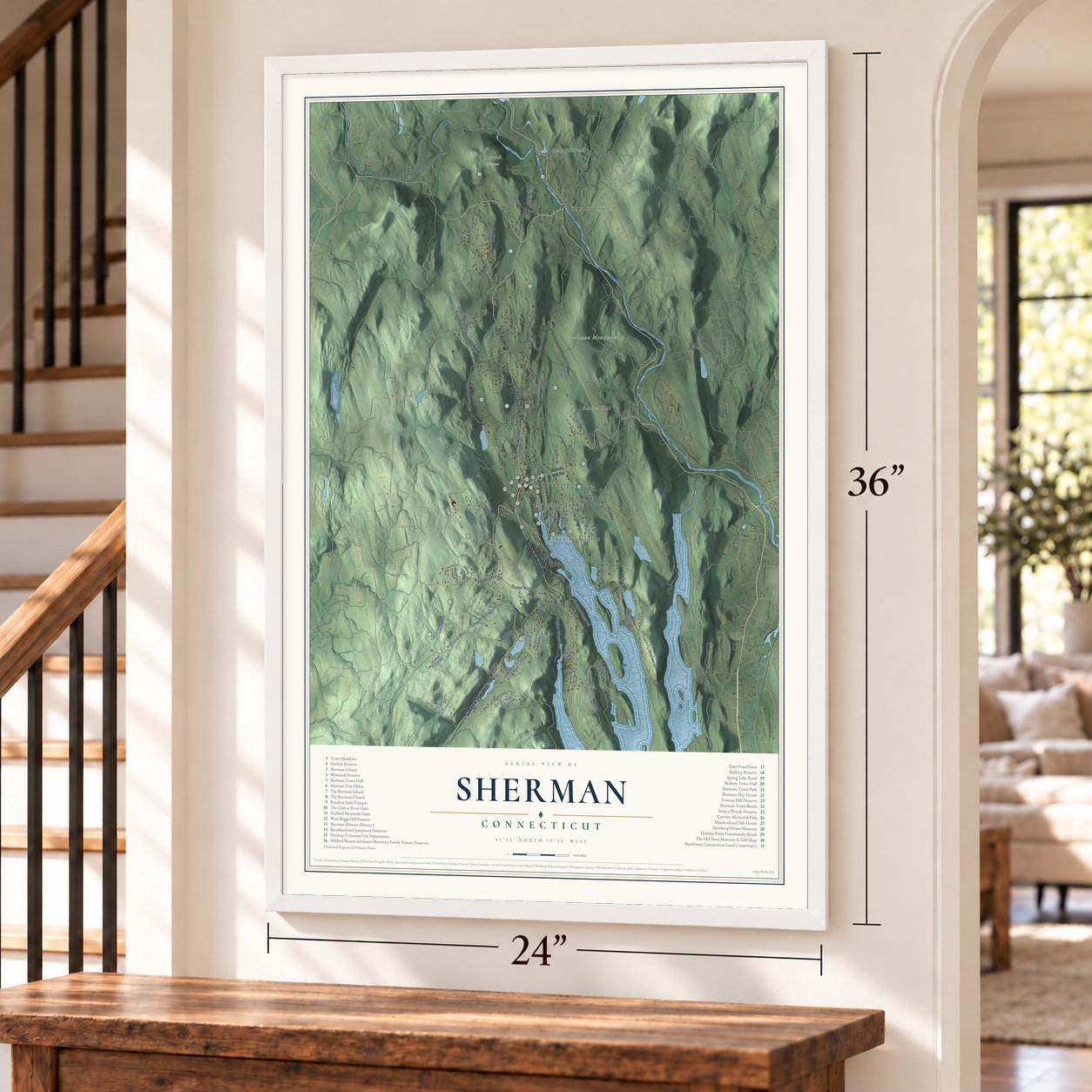 Sherman, Connecticut map, 24 x 36 inch print in a white frame by a staircase