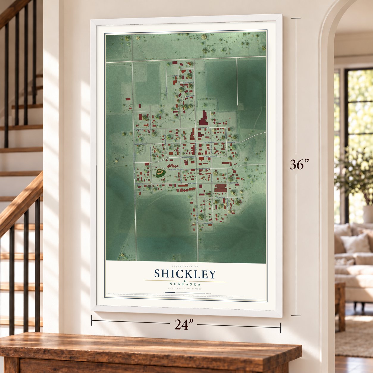 Shickley, Nebraska map, 24 x 36 inch print in a white frame by a staircase