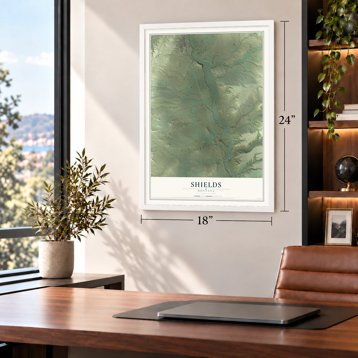 Shields, Montana map, 18 x 24 inch print in a white frame in a home office