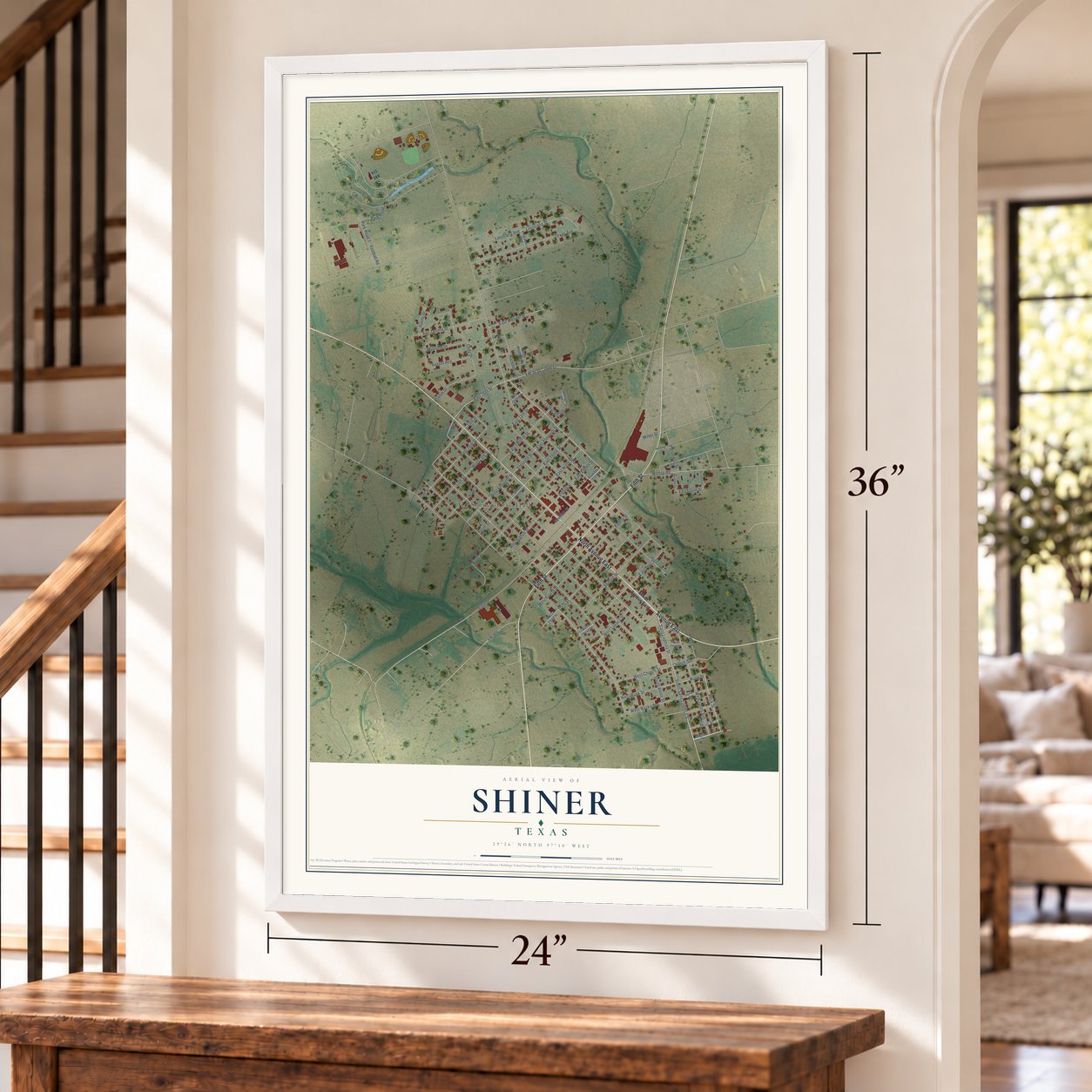 Shiner, Texas map, 24 x 36 inch print in a white frame by a staircase