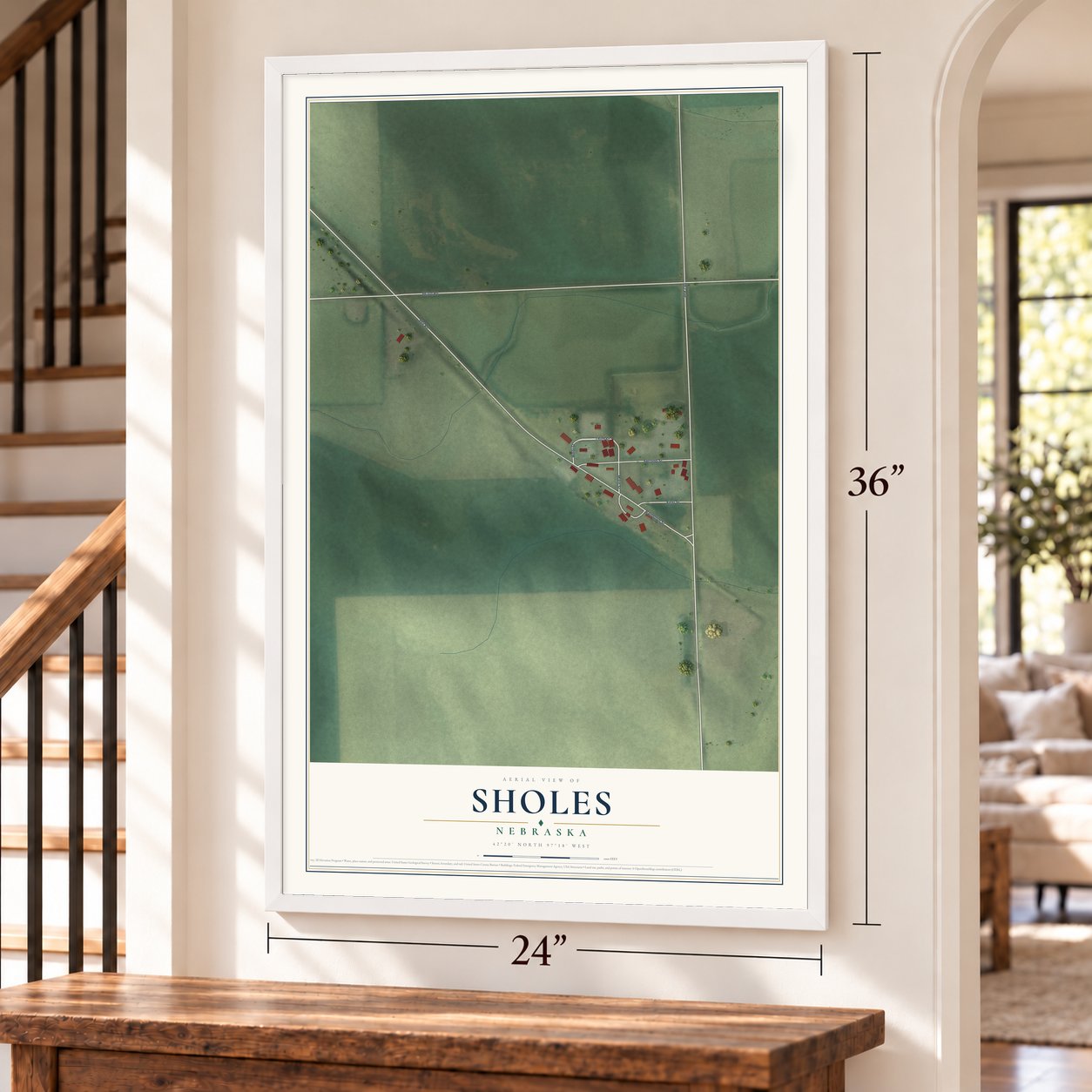 Sholes, Nebraska map, 24 x 36 inch print in a white frame by a staircase