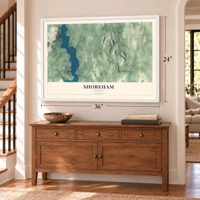 Shoreham, Vermont map, 24 x 36 inch print in a white frame above a dresser by a staircase