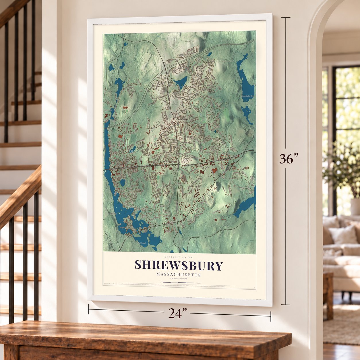 Shrewsbury, Massachusetts map, 24 x 36 inch print in a white frame by a staircase