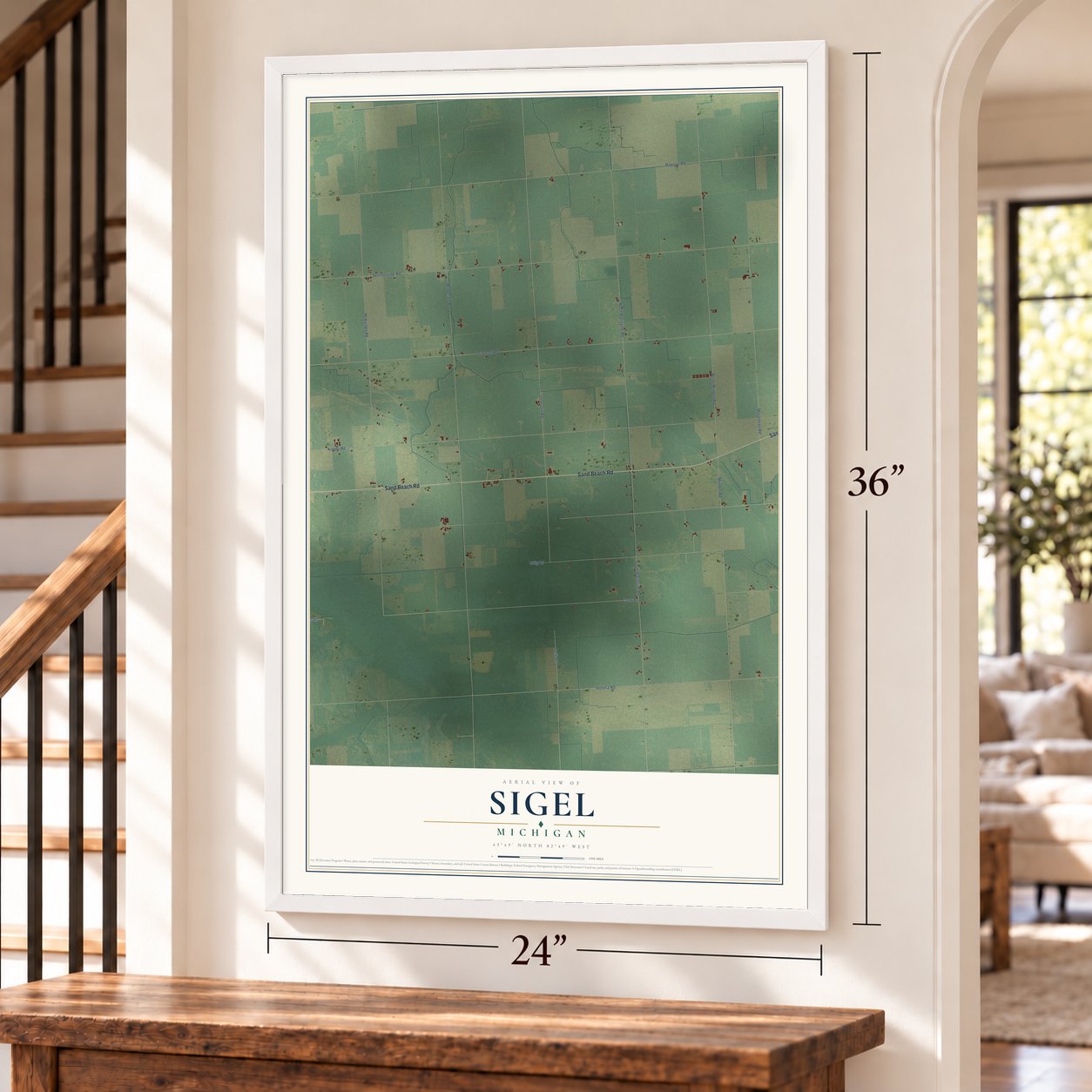 Sigel, Michigan map, 24 x 36 inch print in a white frame by a staircase
