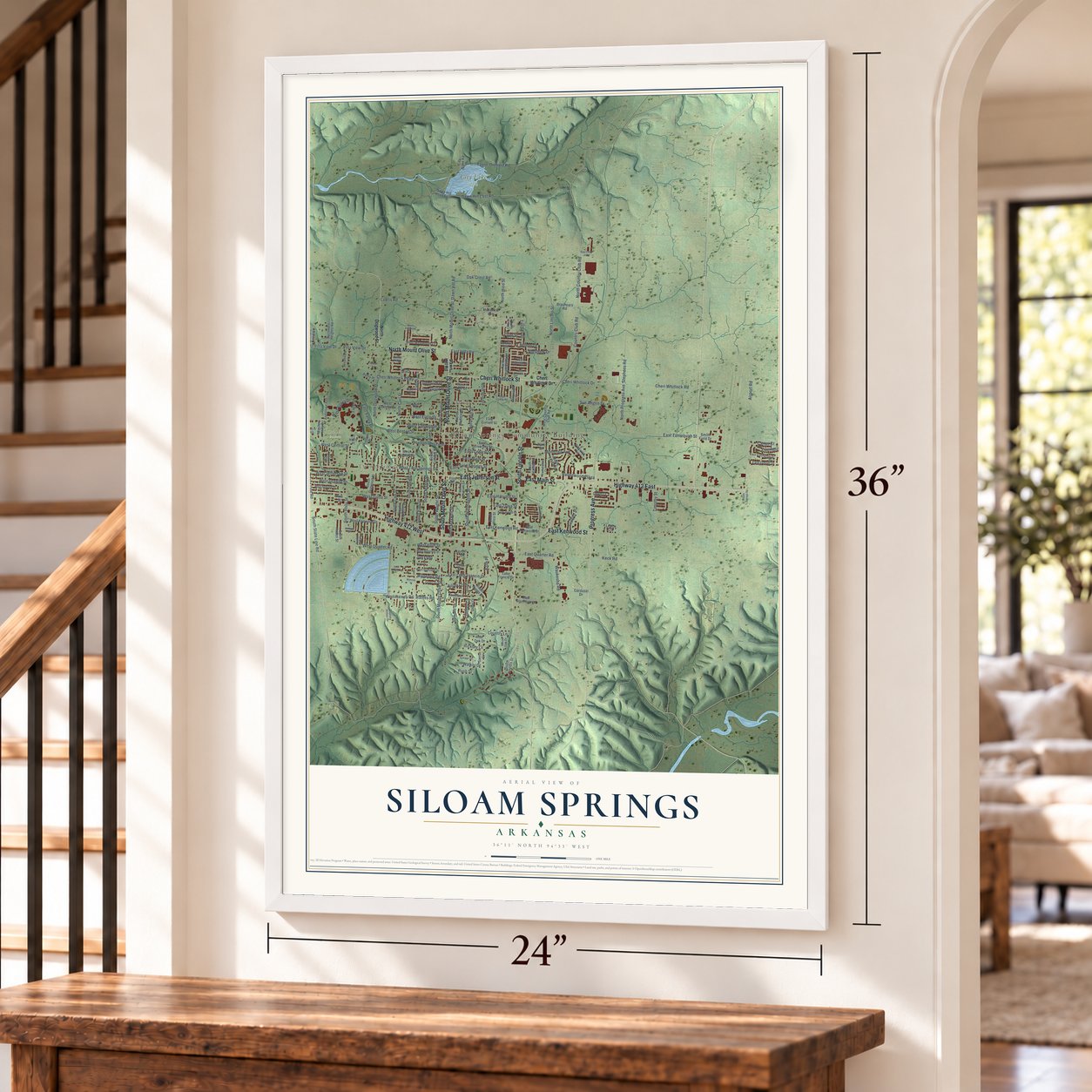 Siloam Springs, Arkansas map, 24 x 36 inch print in a white frame by a staircase