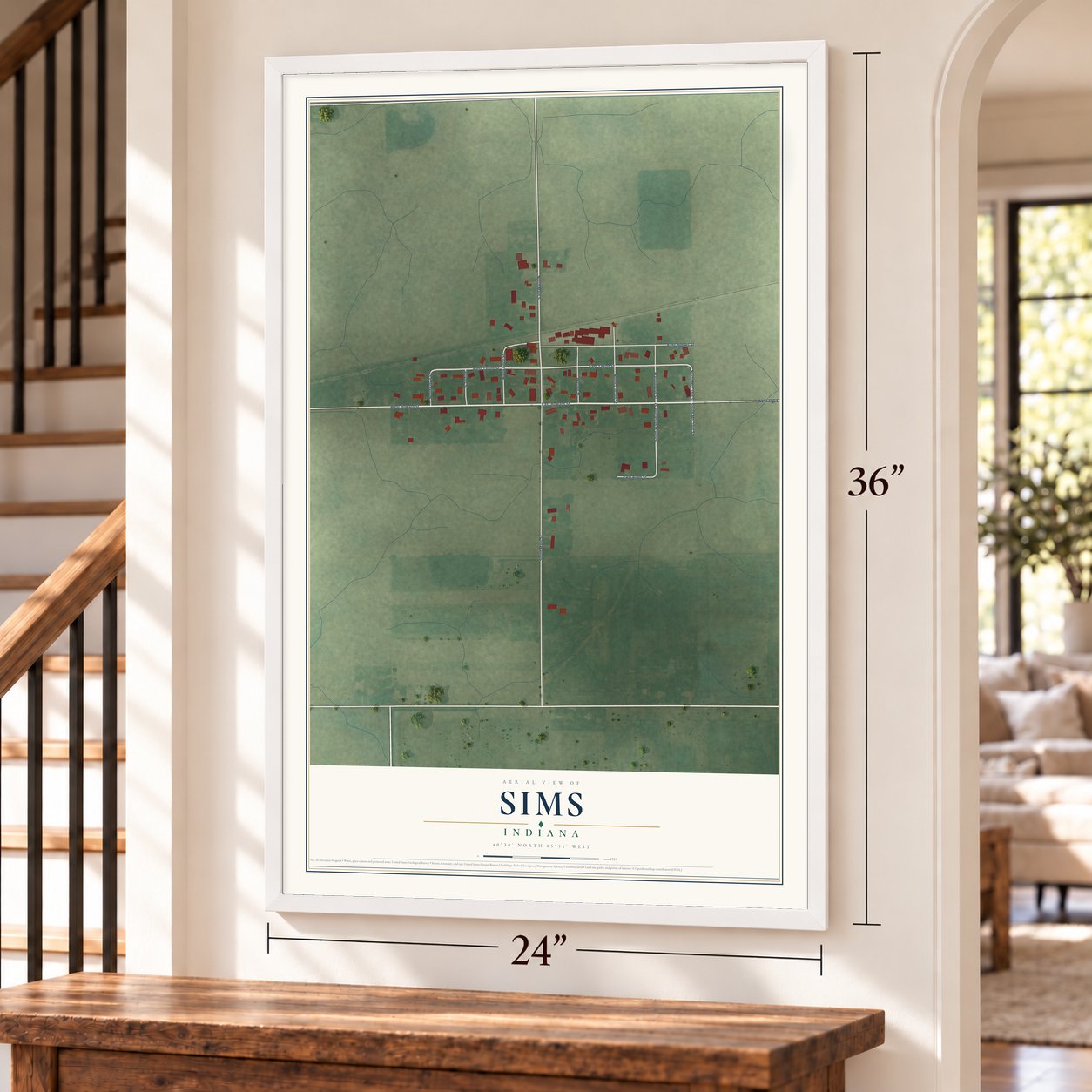 Sims, Indiana map, 24 x 36 inch print in a white frame by a staircase
