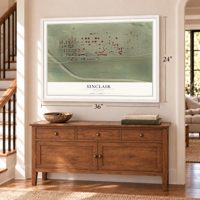 Sinclair, Wyoming map, 24 x 36 inch print in a white frame above a dresser by a staircase