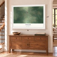 Singer, Louisiana map, 24 x 36 inch print in a white frame above a dresser by a staircase