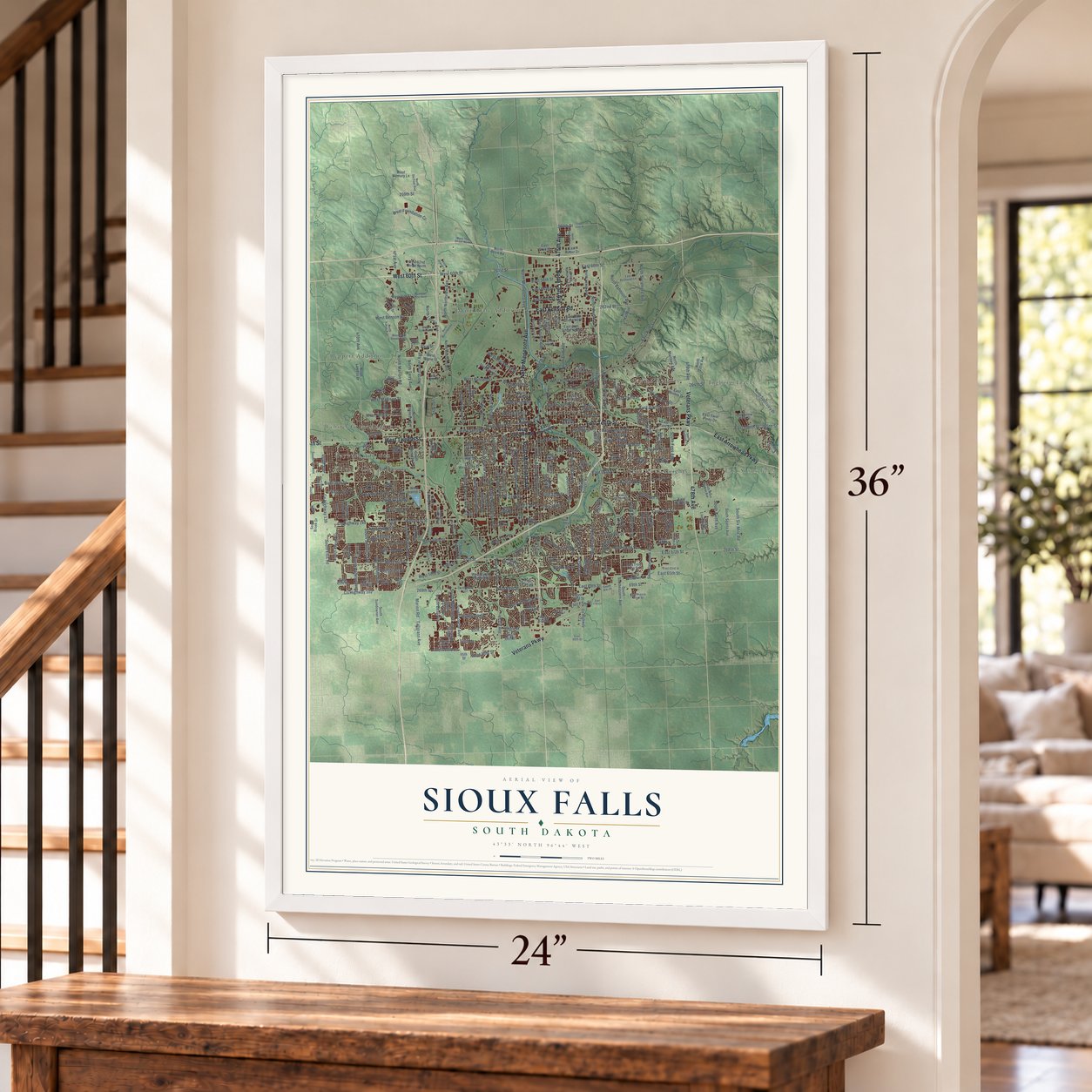 Sioux Falls, South Dakota map, 24 x 36 inch print in a white frame by a staircase