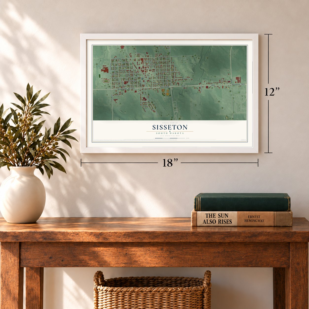 Sisseton, South Dakota map, 12 x 18 inch print in a white frame in an entryway
