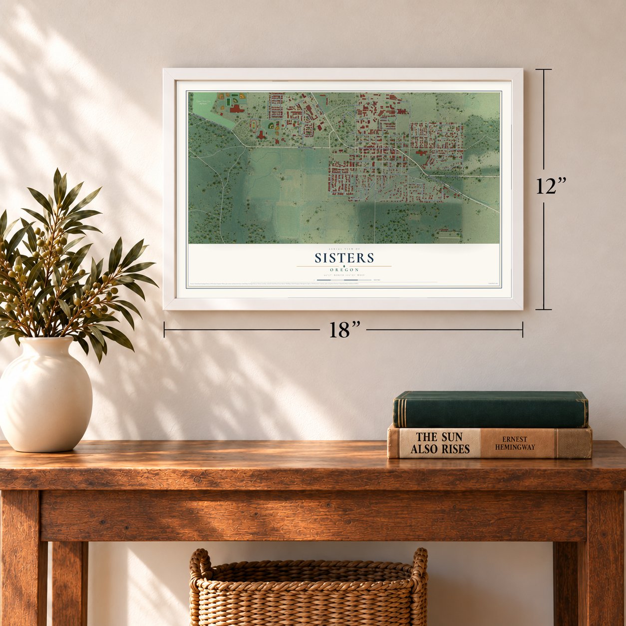 Sisters, Oregon map, 12 x 18 inch print in a white frame in an entryway