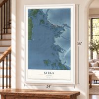 Sitka, Alaska map, 24 x 36 inch print in a white frame by a staircase