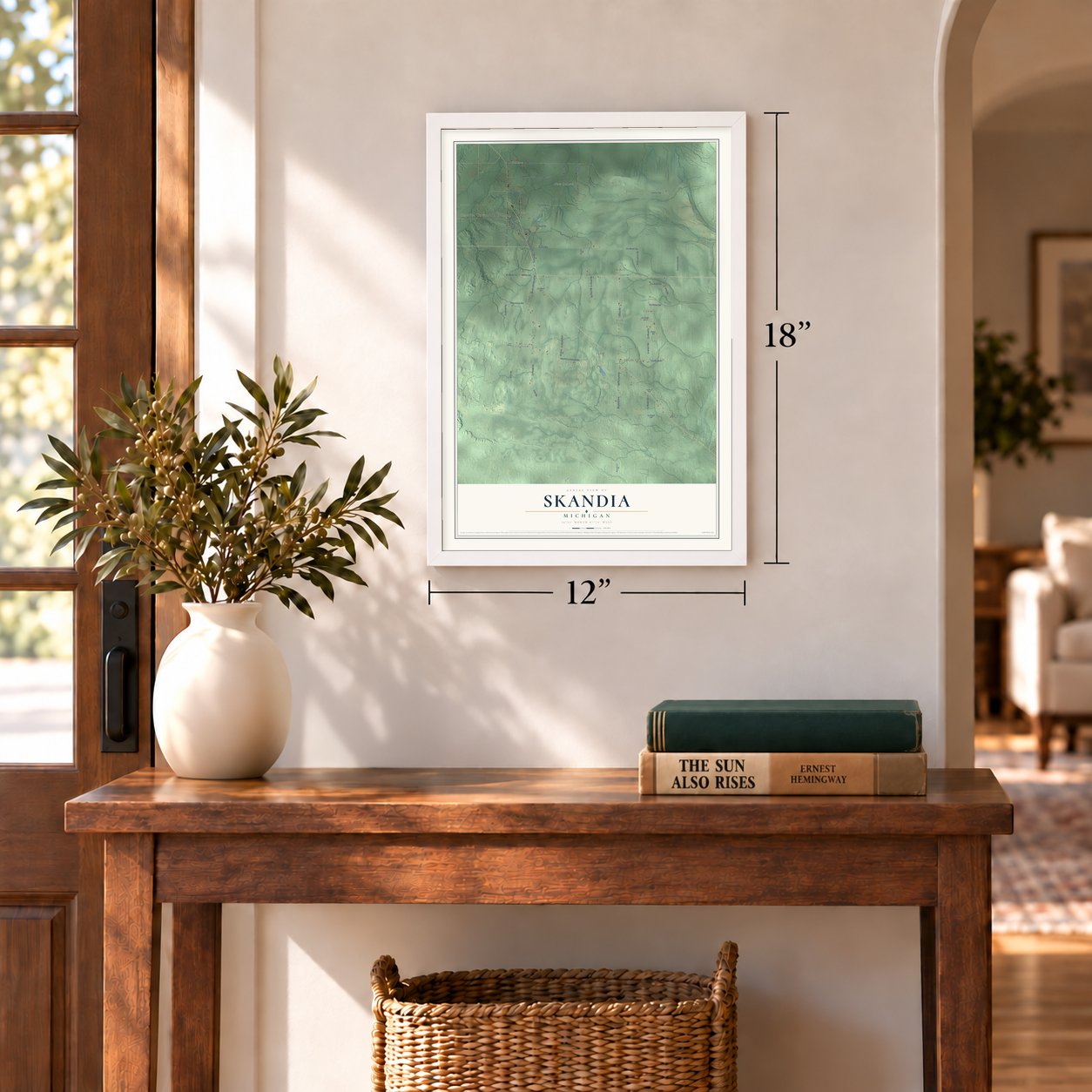 Skandia, Michigan map, 12 x 18 inch print in a white frame in an entryway