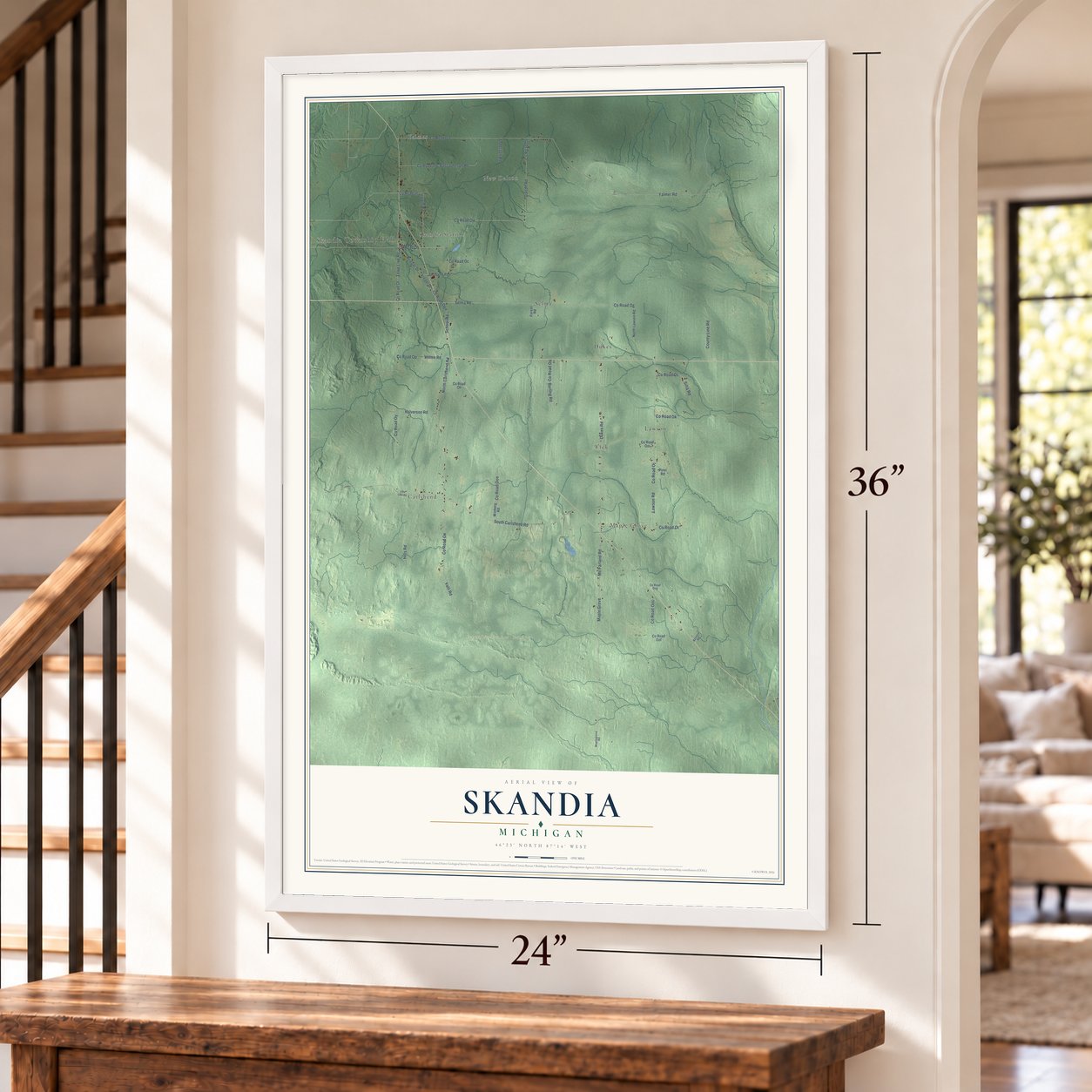 Skandia, Michigan map, 24 x 36 inch print in a white frame by a staircase