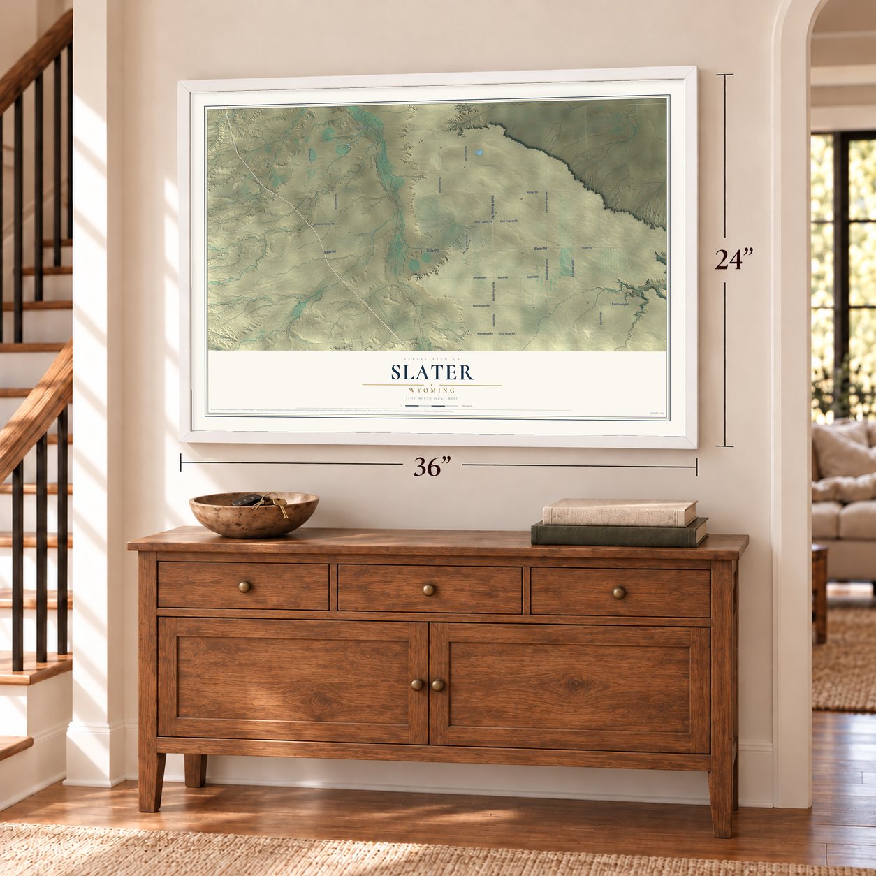 Slater, Wyoming map, 24 x 36 inch print in a white frame above a dresser by a staircase