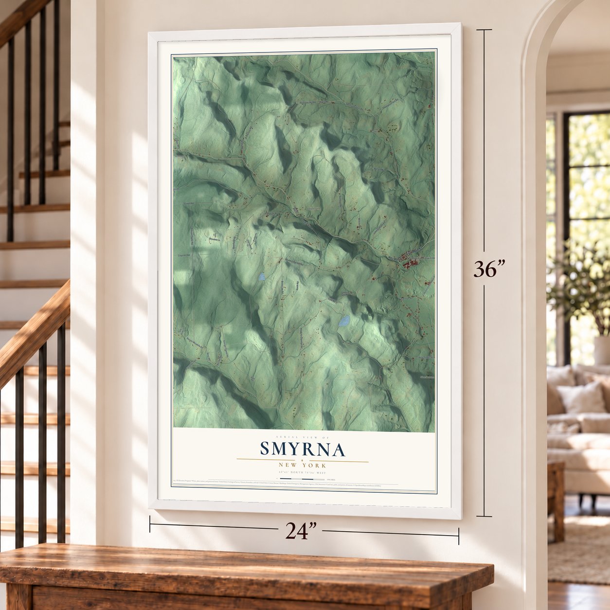 Smyrna, New York map, 24 x 36 inch print in a white frame by a staircase