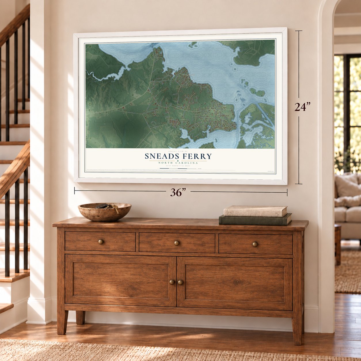 Sneads Ferry, North Carolina map, 24 x 36 inch print in a white frame above a dresser by a staircase