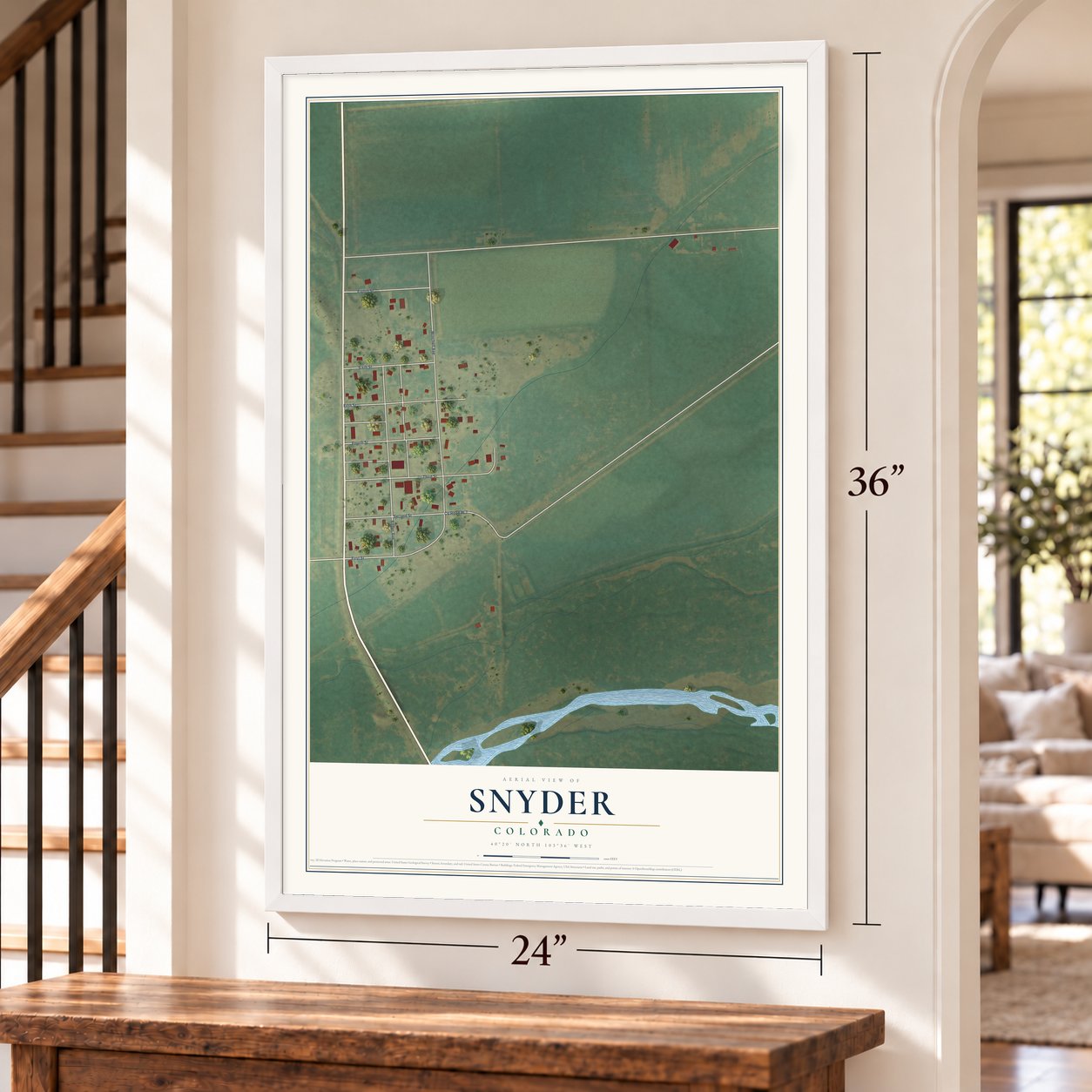 Snyder, Colorado map, 24 x 36 inch print in a white frame by a staircase