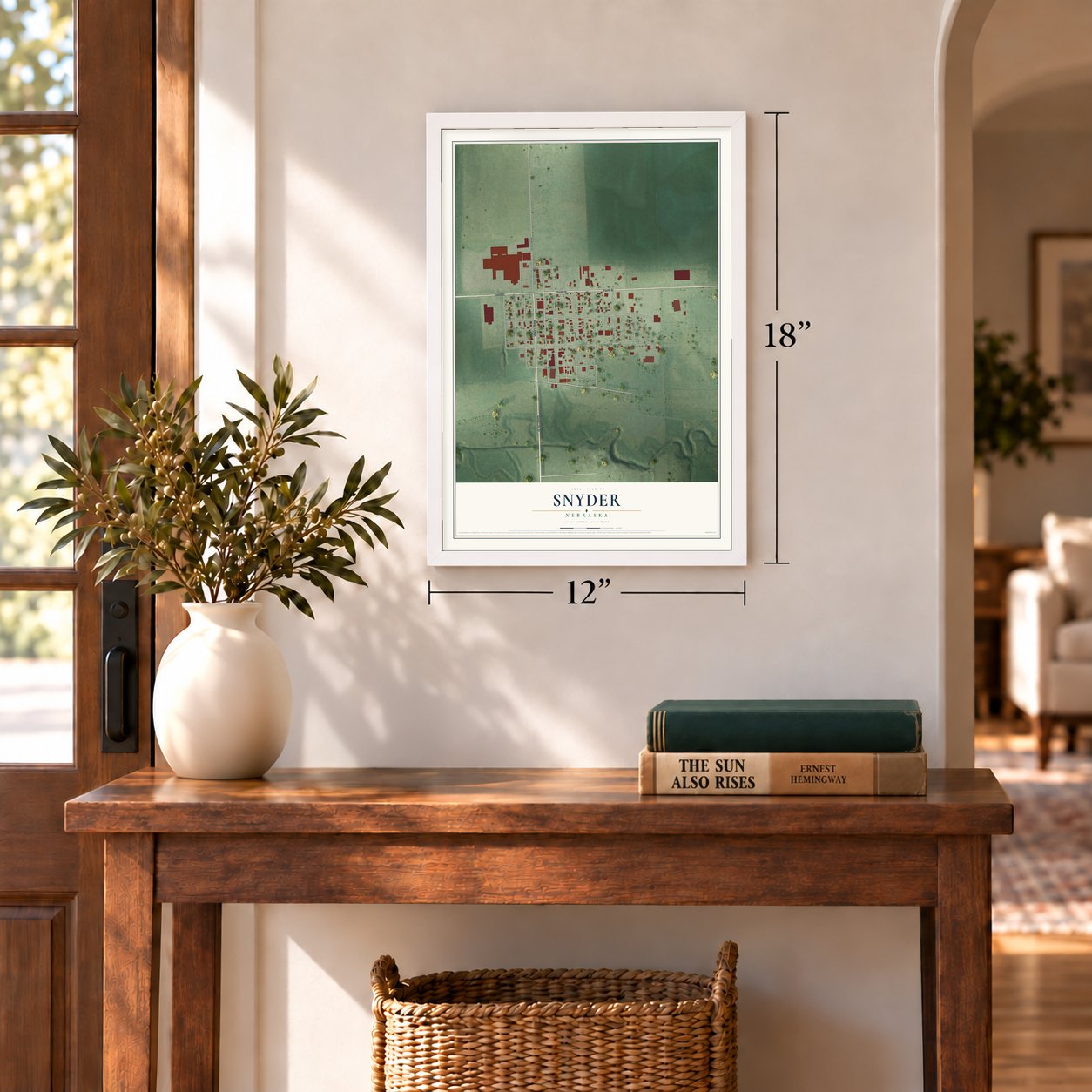 Snyder, Nebraska map, 12 x 18 inch print in a white frame in an entryway