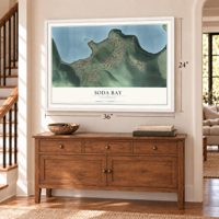 Soda Bay, California map, 24 x 36 inch print in a white frame above a dresser by a staircase