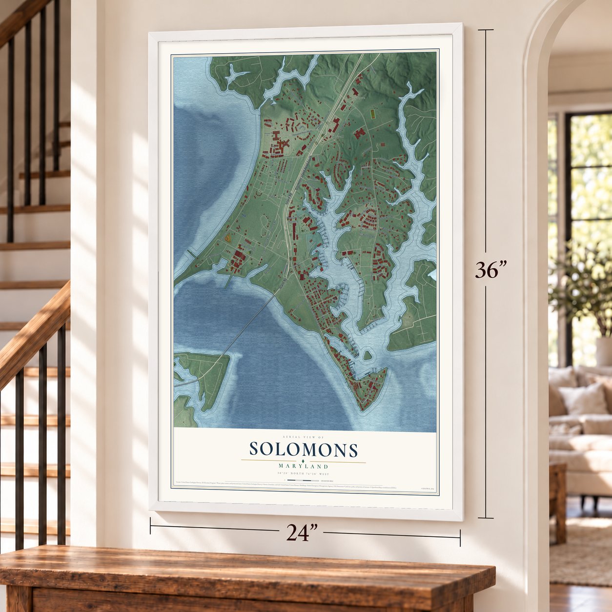 Solomons, Maryland map, 24 x 36 inch print in a white frame by a staircase