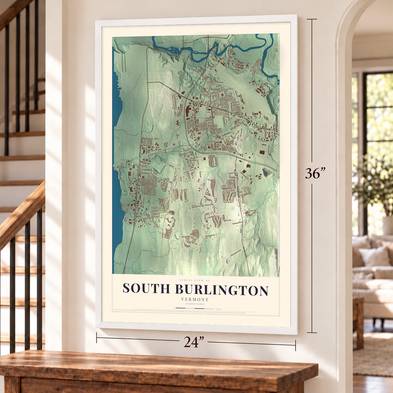 South Burlington, Vermont map, 24 x 36 inch print in a white frame by a staircase