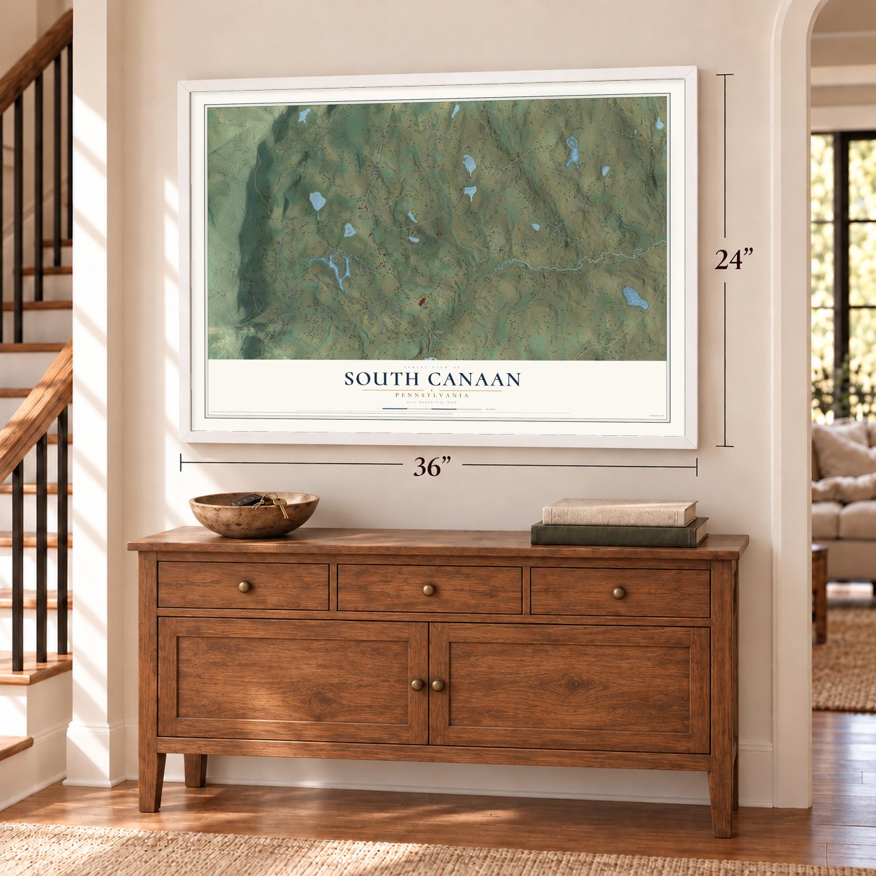 South Canaan, Pennsylvania map, 24 x 36 inch print in a white frame above a dresser by a staircase
