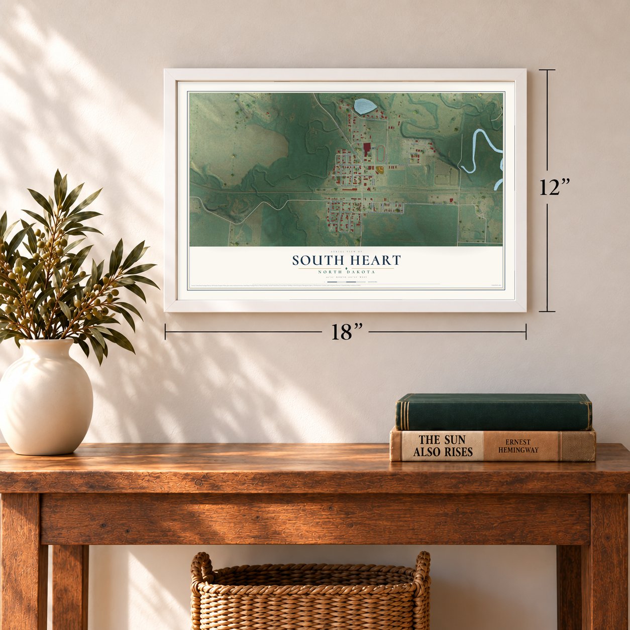 South Heart, North Dakota map, 12 x 18 inch print in a white frame in an entryway