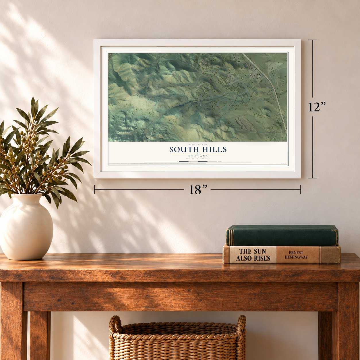 South Hills, Montana map, 12 x 18 inch print in a white frame in an entryway