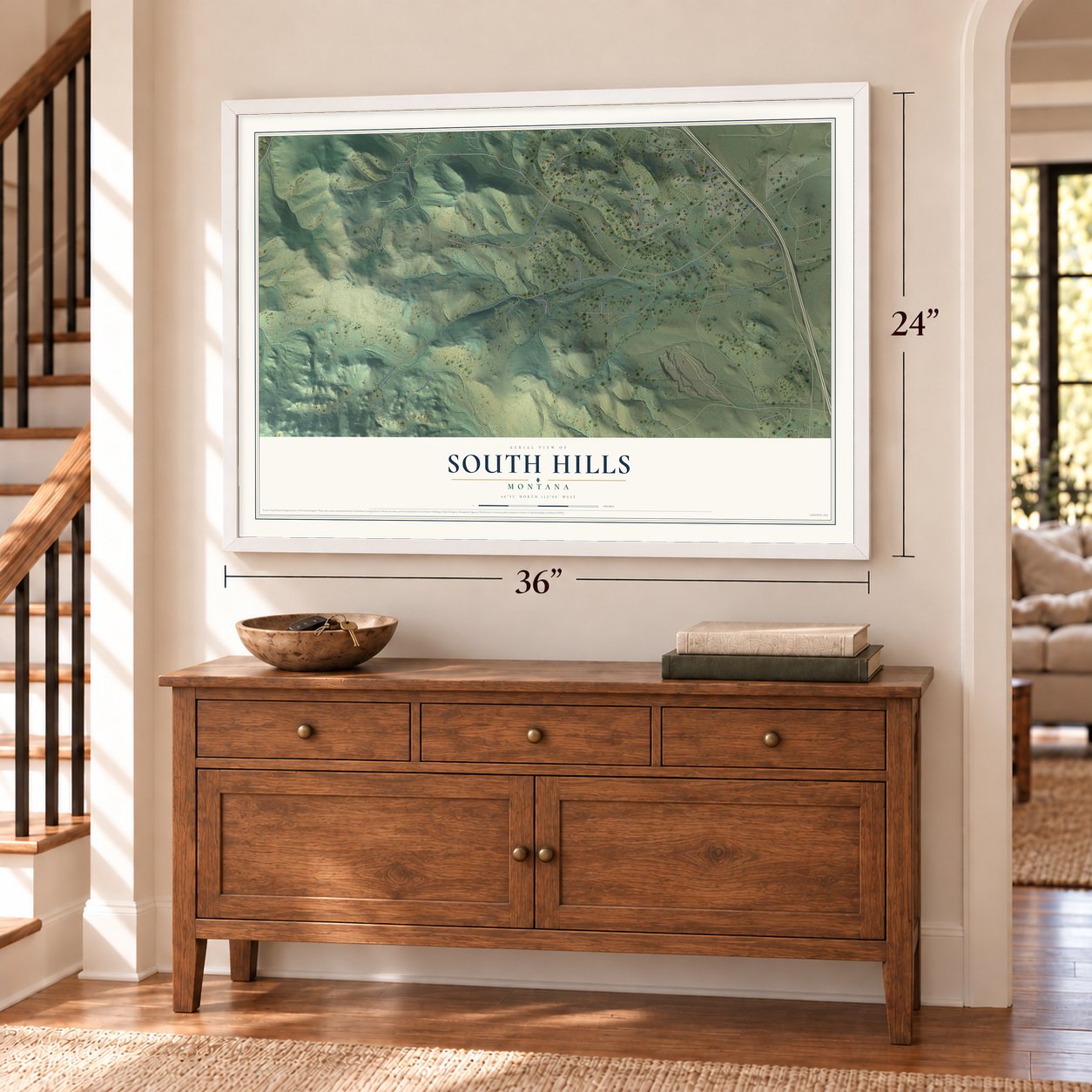 South Hills, Montana map, 24 x 36 inch print in a white frame above a dresser by a staircase