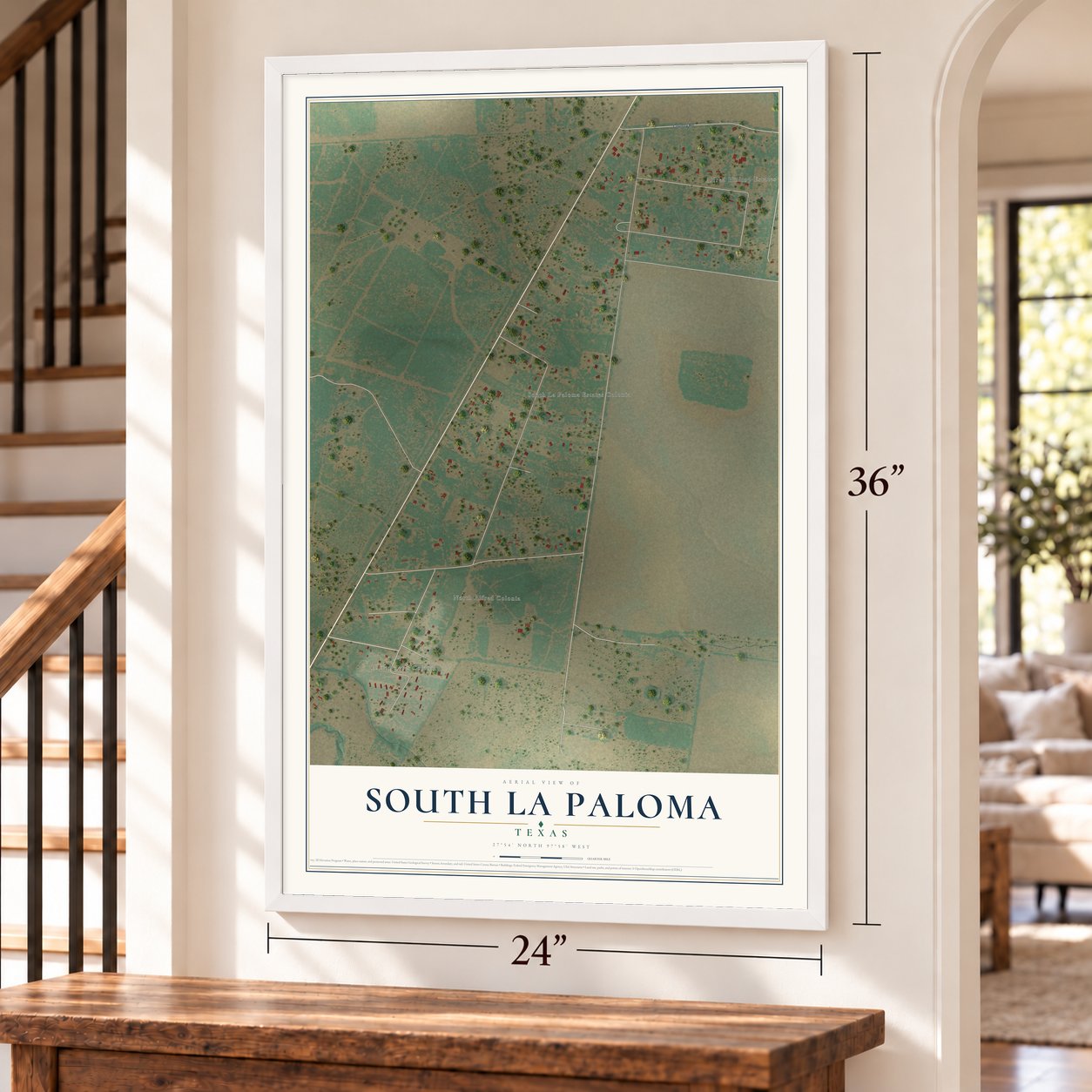 South La Paloma, Texas map, 24 x 36 inch print in a white frame by a staircase