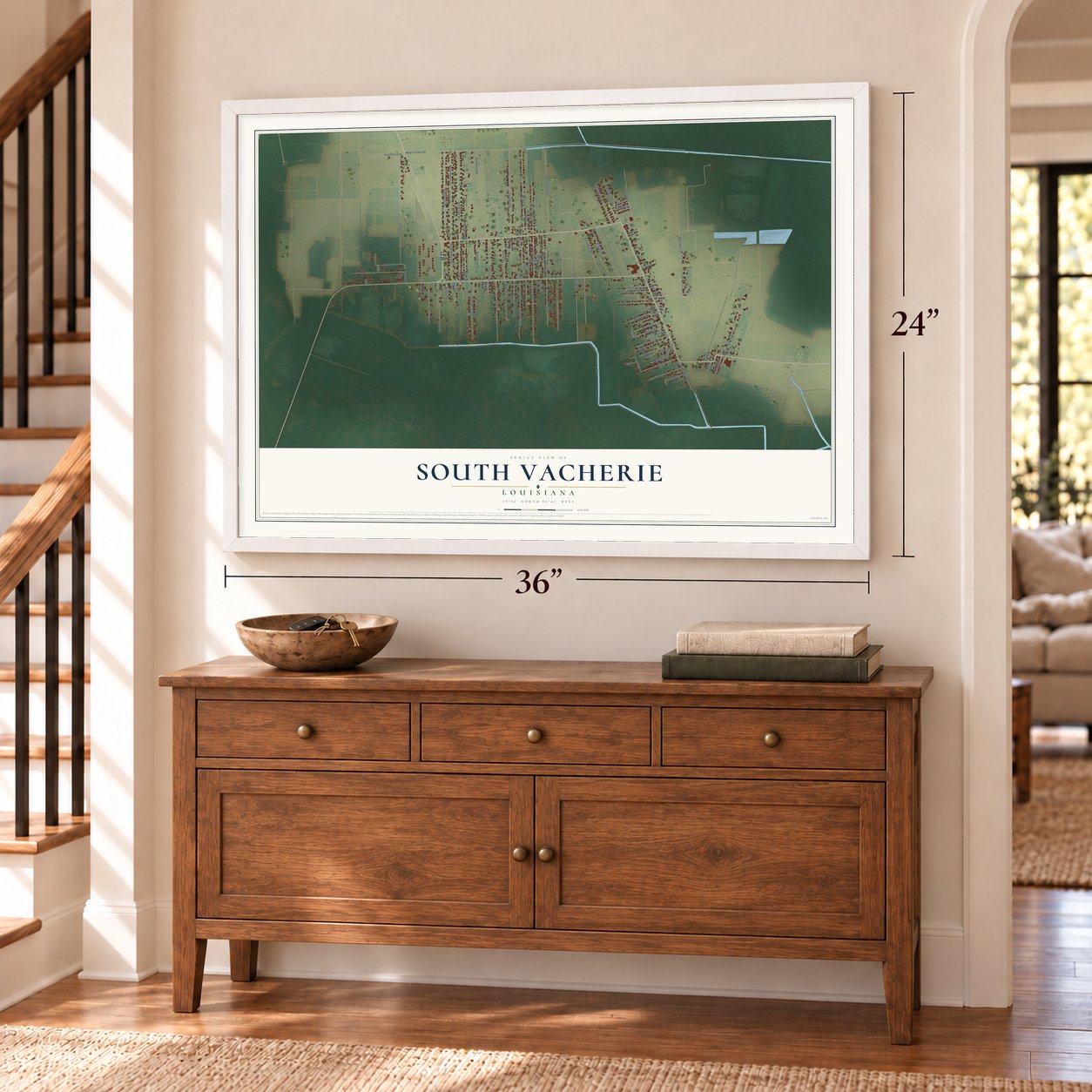 South Vacherie, Louisiana map, 24 x 36 inch print in a white frame above a dresser by a staircase