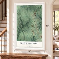 South Vinemont, Alabama map, 24 x 36 inch print in a white frame by a staircase