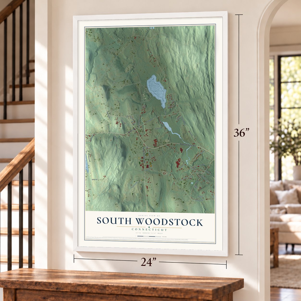 South Woodstock, Connecticut map, 24 x 36 inch print in a white frame by a staircase
