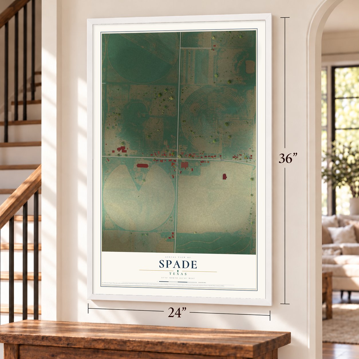 Spade, Texas map, 24 x 36 inch print in a white frame by a staircase